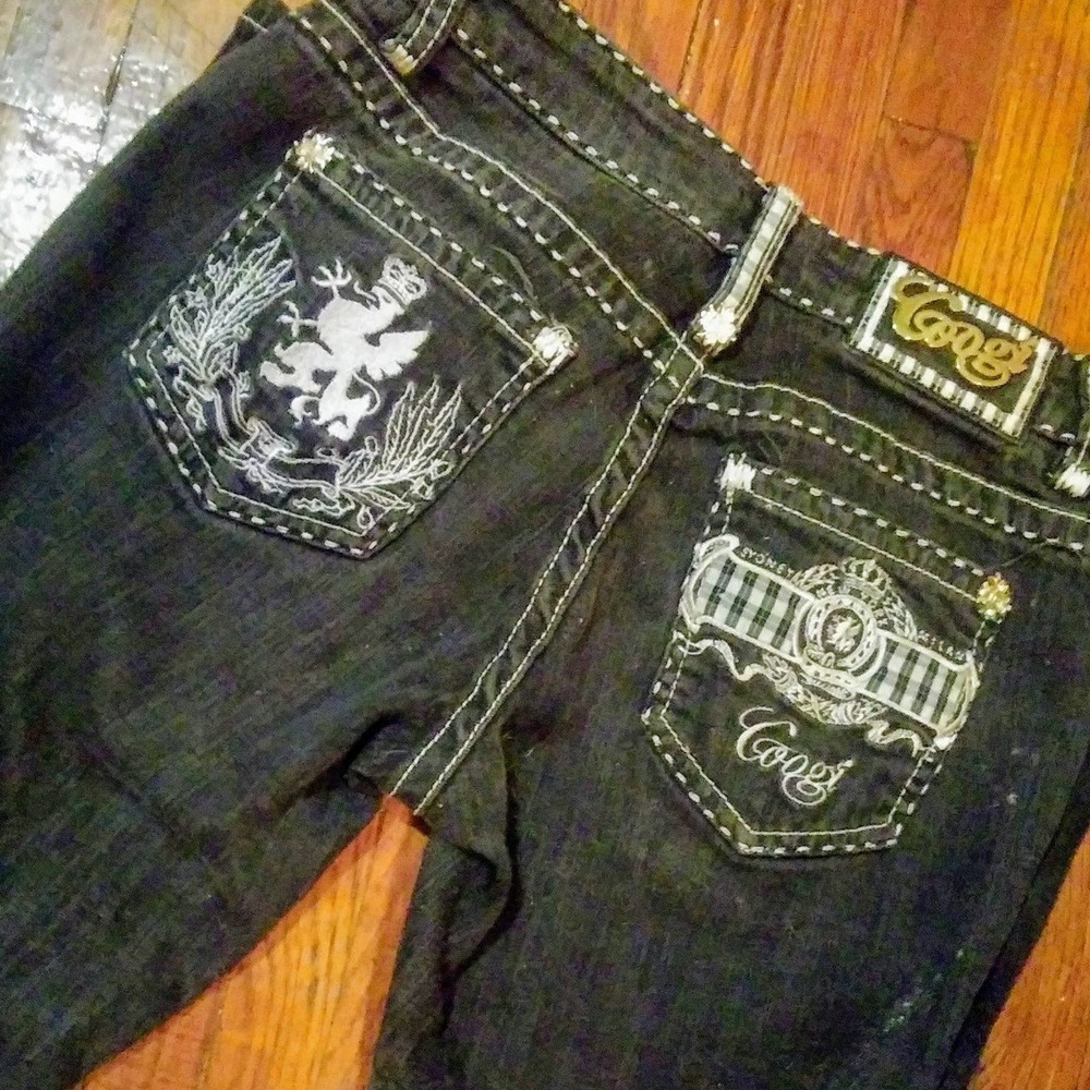 Coogi. Ladies Blue Jeans 1/2

 * 98 1/2% Cotton ,